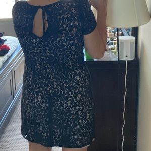 Black lace dress with nude slip.